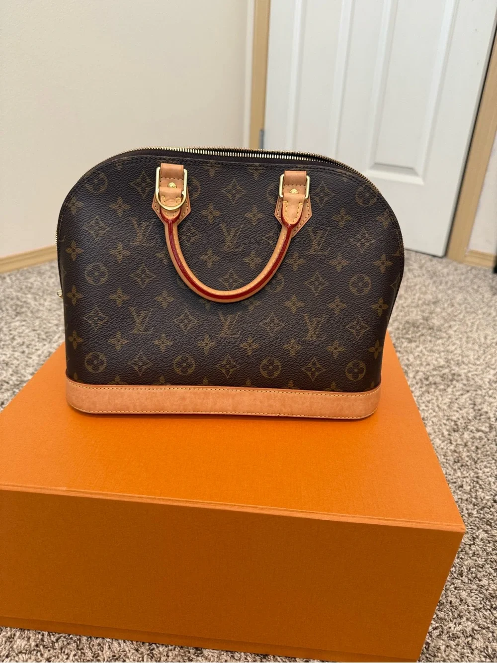 Louis Vuitton Monogram Alma Handbag in Brown and Tan